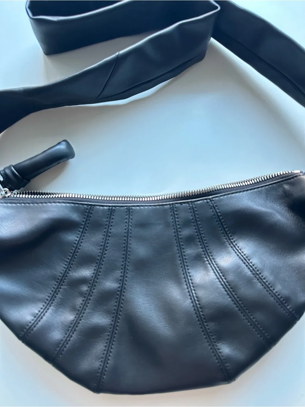 Black croissant bag